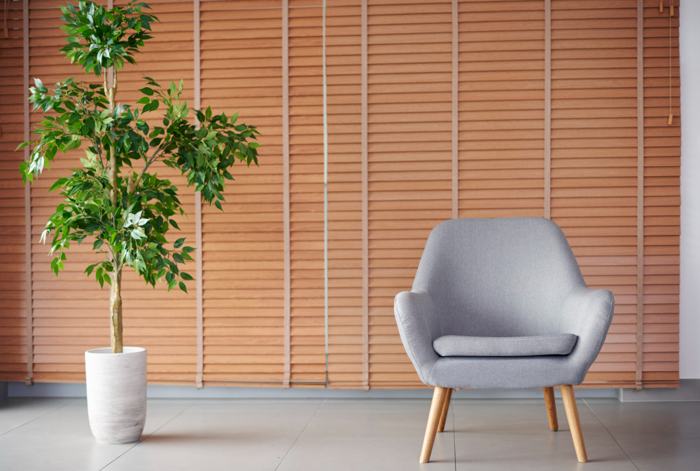 shot-empty-armchair-with-flower-pot